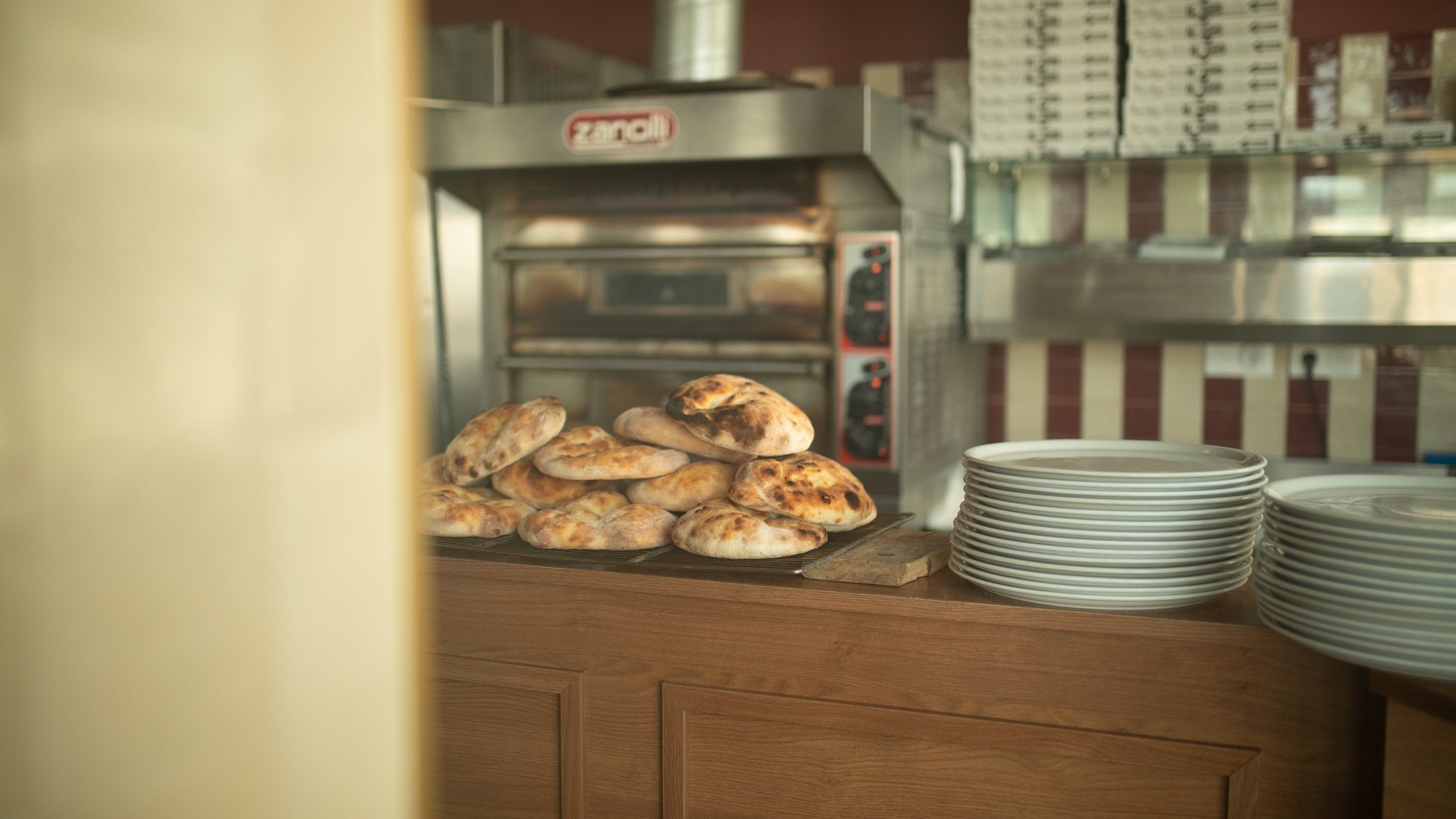Focaccie tout juste sorties du four à pizza de Toscanacci